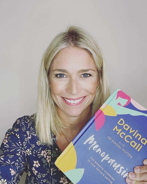 Dr Naomi Potter with her award winning book - Menopausing